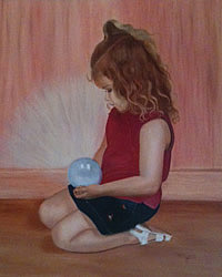 girl looking into crystal ball