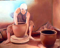 man making pottery